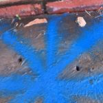 Water leak detection driveway marker
