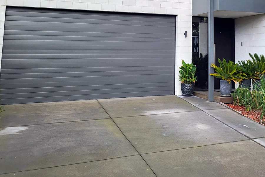 water leak under concrete driveway