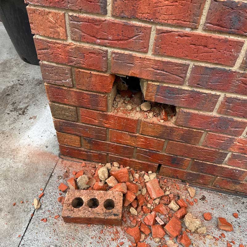 burst water pipe behind wall